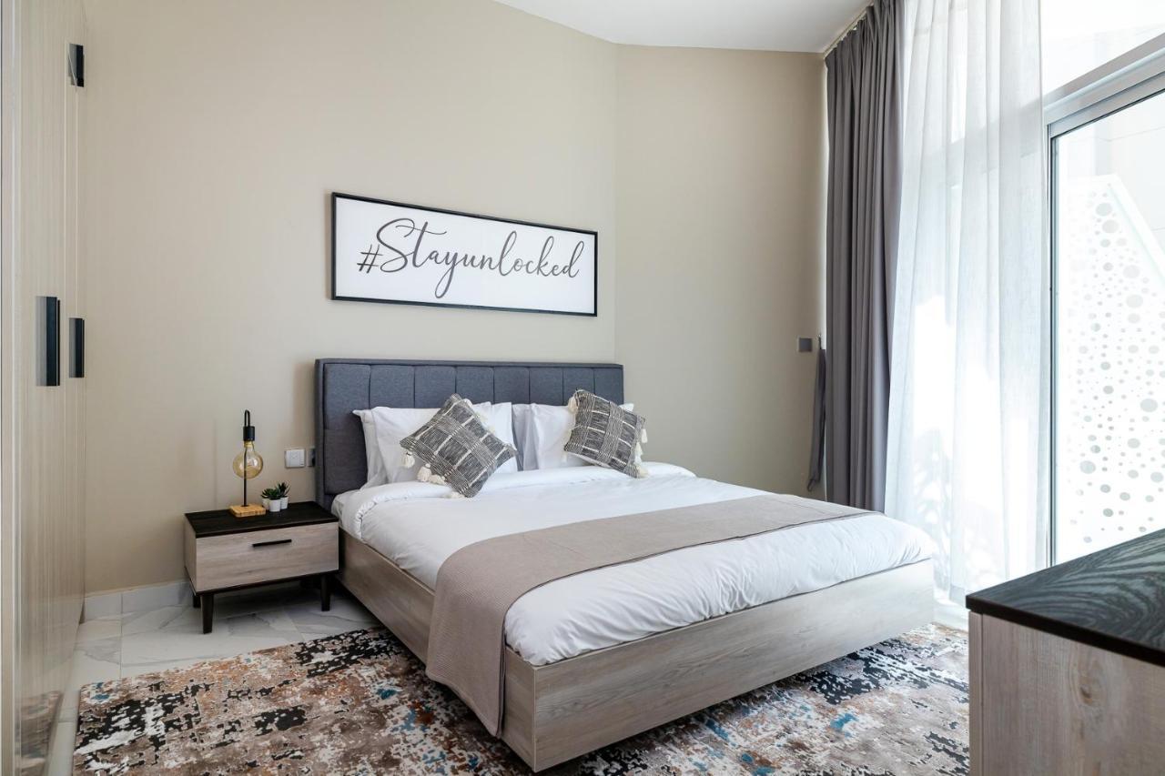 Apartamento Unlock Waters Edge Dubái Exterior foto