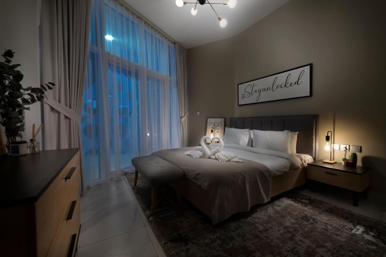 Apartamento Unlock Waters Edge Dubái Exterior foto